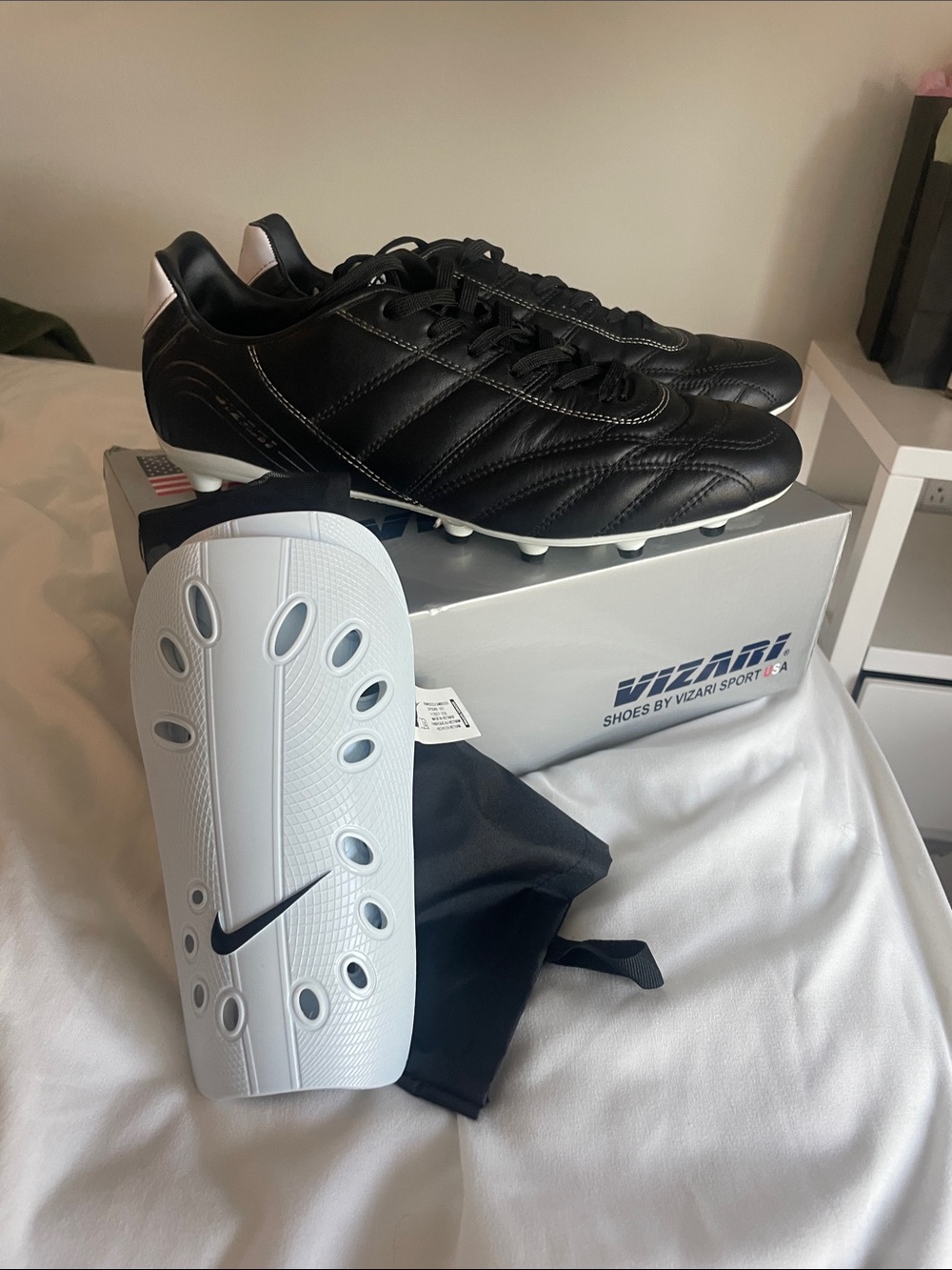 Men's Black Athletic Soccer Cleats with White Shin Guards